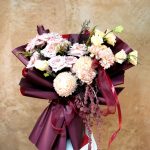 Burgundy framed blush & cream bouquet with cream mums and blush roses